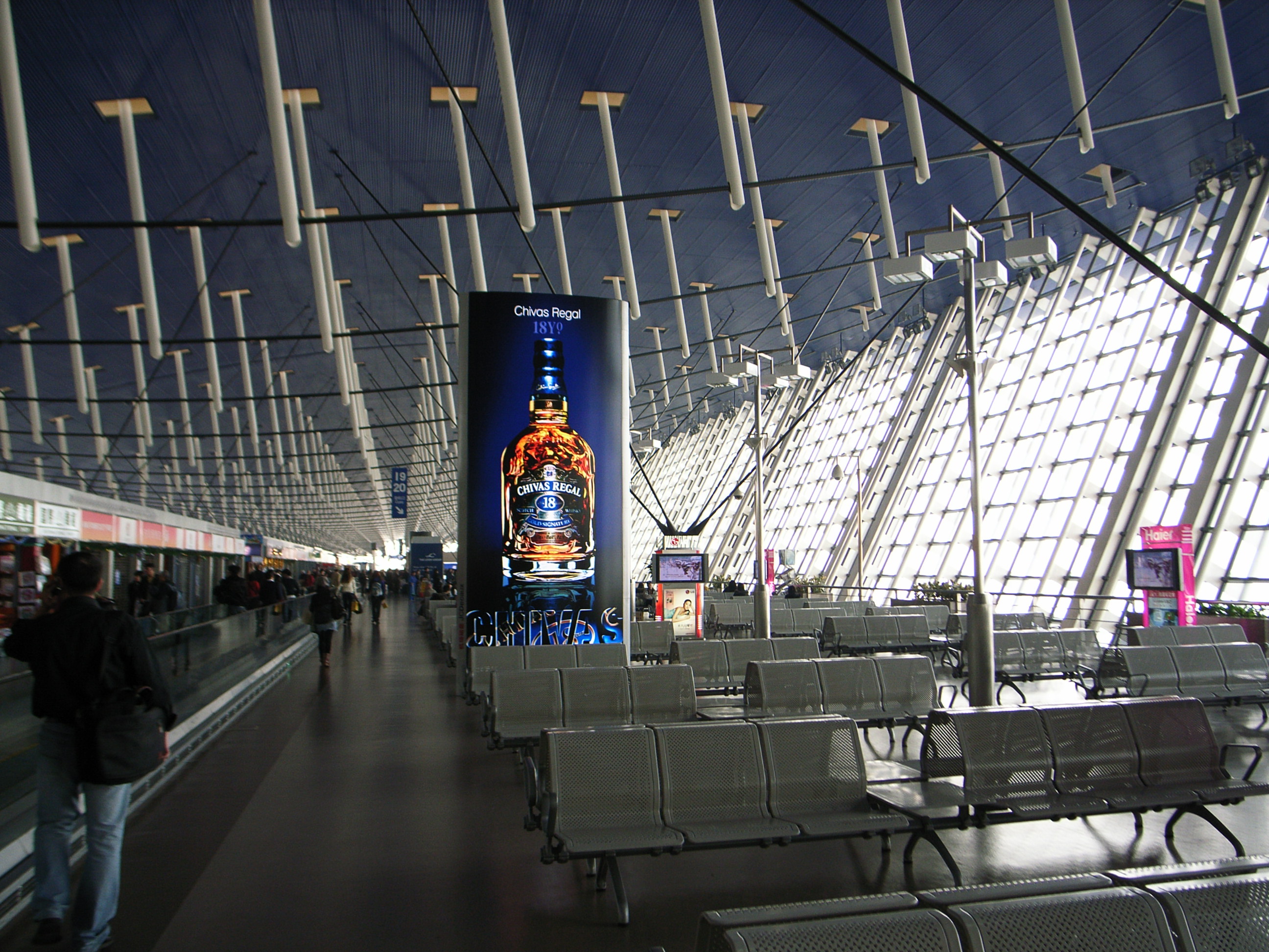 Seating and expansive windows inside Shanghai Pudong Terminal 1